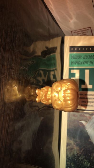 Фигурка гарри поттера золотого!