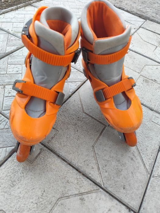 Коньки роликовые