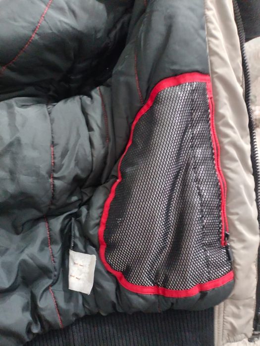 Продам оригинальный пуховик