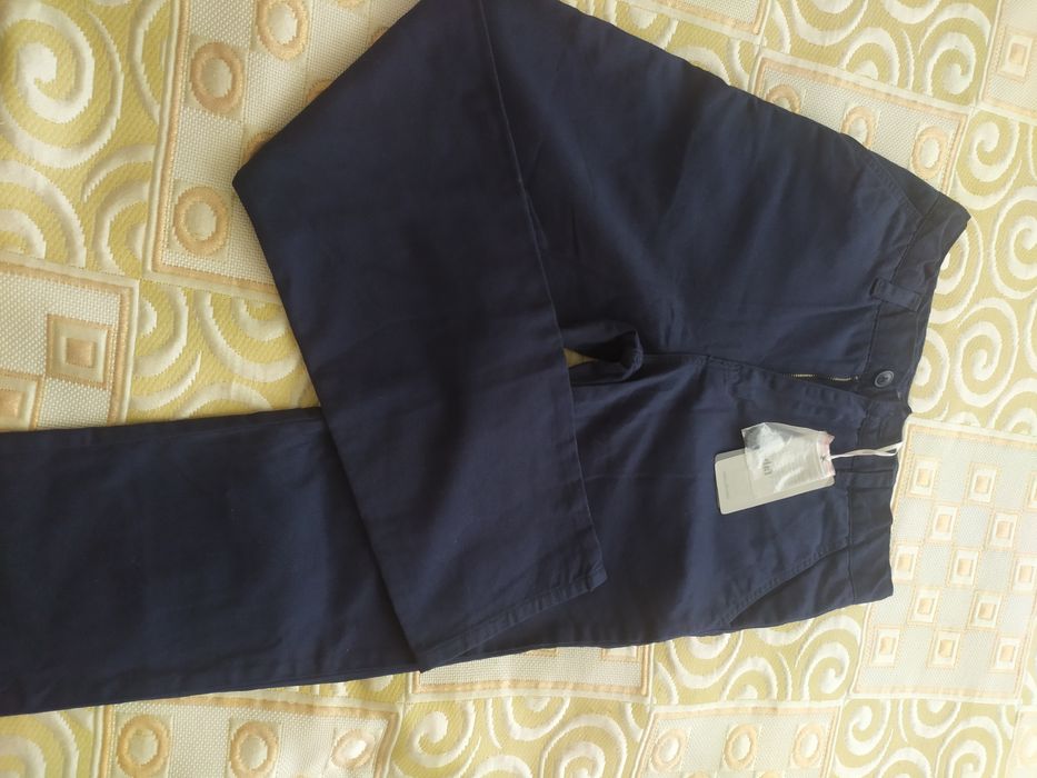 Продам  новые темно  синие брюки