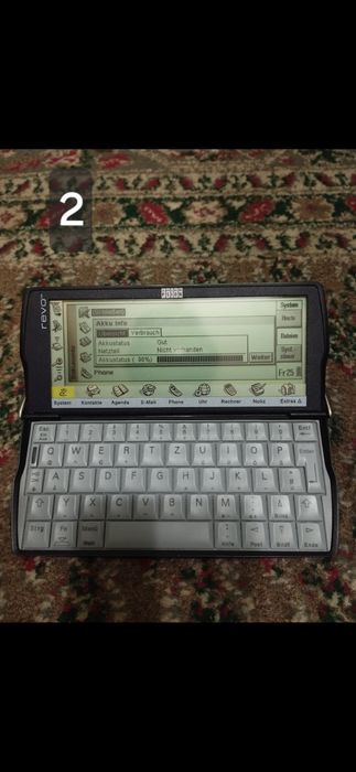revolution computer calculator-"Psion" anului 99,functional ,colectie