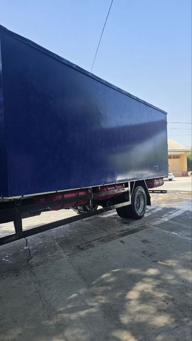 Isuzu Katta bort yuk tashuvchi (10 tonnali)