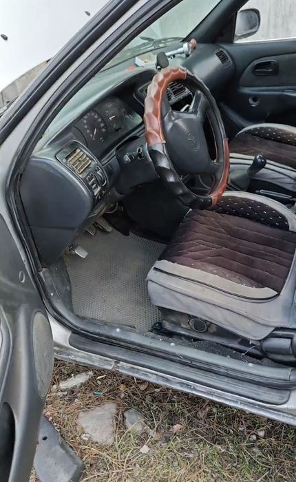 Тайота каролла 107