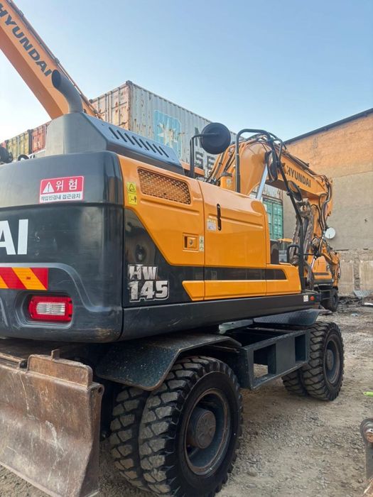 Услуги колесного экскаватора