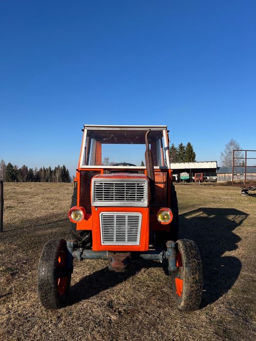 Vand tractor universal 445 UTB cu plug disc si cupa in tiranț