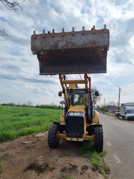 De vinzare sau inchiriat Buldoexcavator