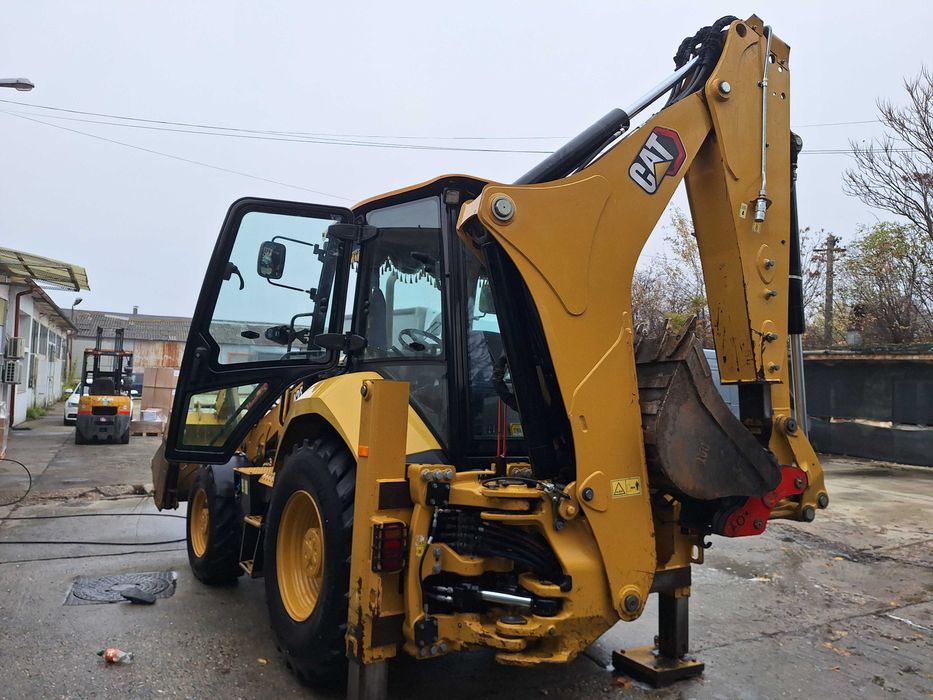 Vand buldoexcavator cat 428