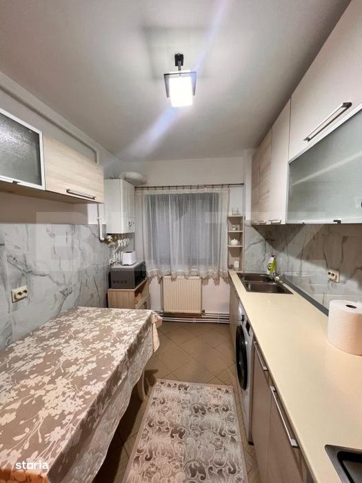 Apartament e inchiriat , 2 camere, fara garantie - zona Rusca