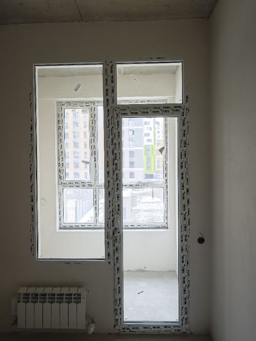 Пластиковое окно с дверью