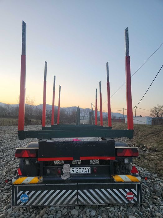 DOLL forestiera transport lemn , busteni si racoante din dezmembrări