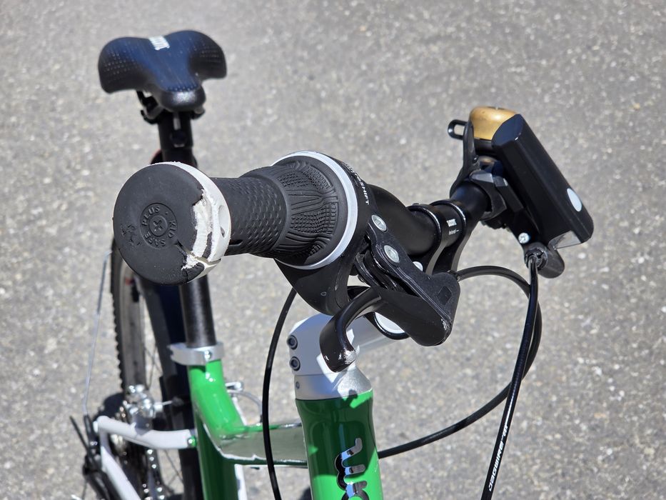 Vand bicicleta WOOM 4 (20") second-hand, verde