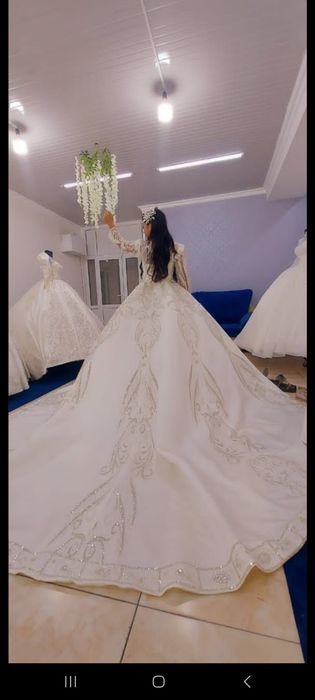 Продаю свадебные платье по цене проката