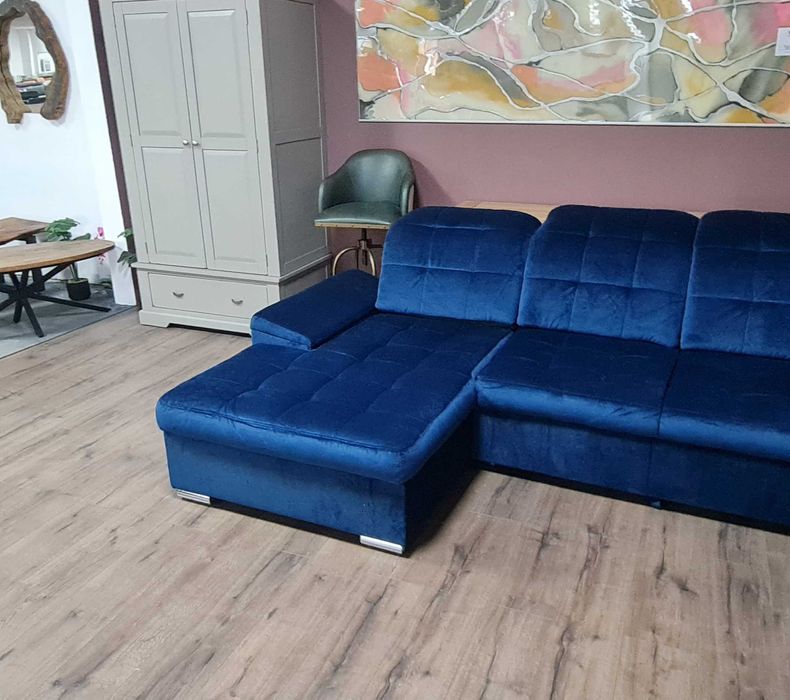 Син П образен ъглов диван от плат Nigrum с функция сън