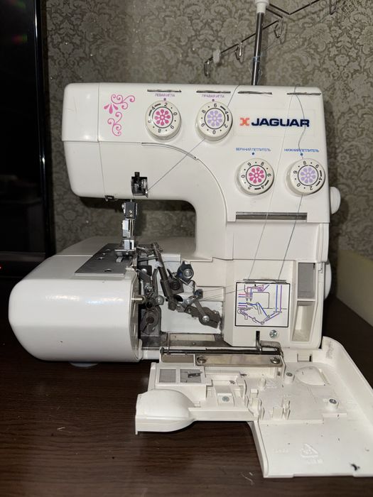 Оверлочная машина Janome