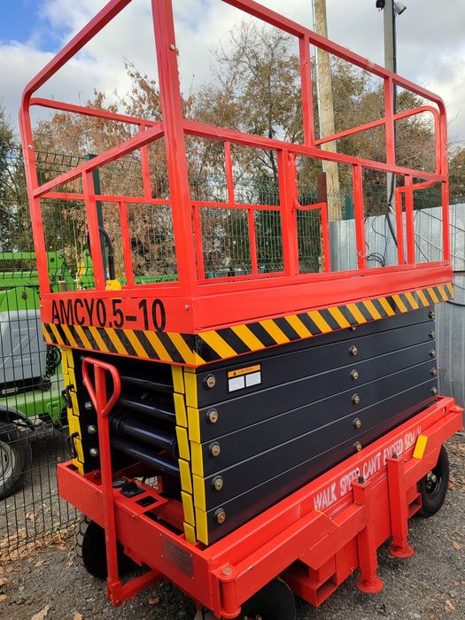 Продам ножничный подъемник