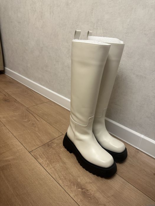 Продам сапоги новые