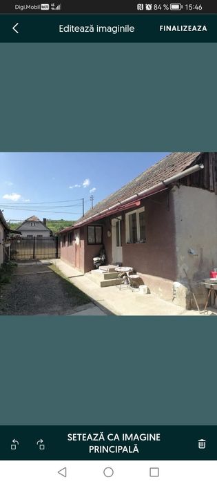 Casa la curte de vanzare