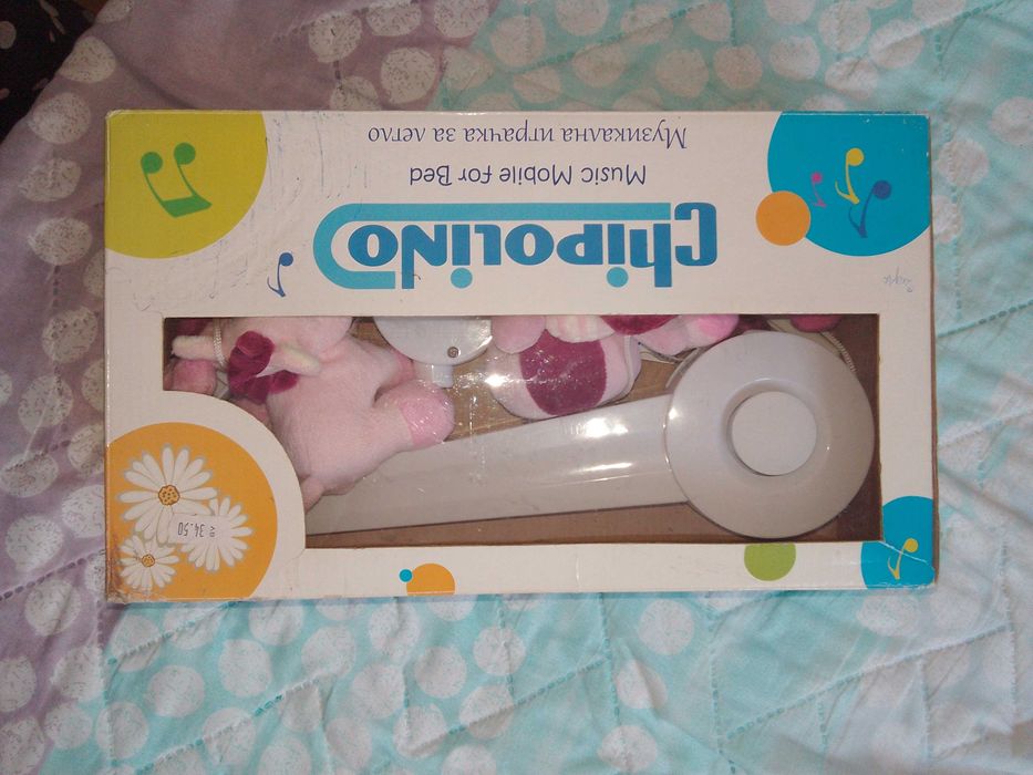 Музикална въртележка за легло