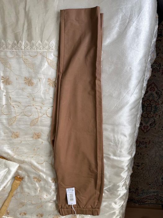 Брюки пройзводство Италия