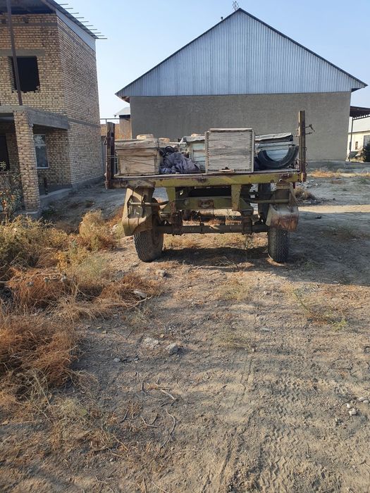 Маз прицеп яхши холатда бортлари хам бор балонлари ковчук