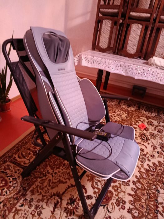 Массажный кресло