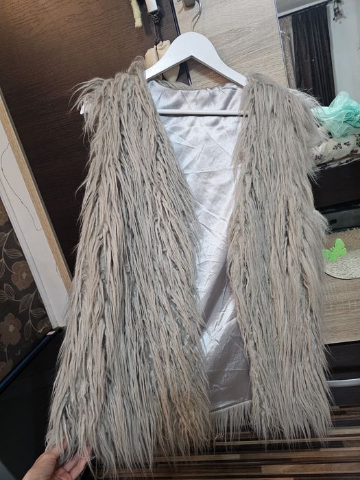 Vesta blanita sintetica