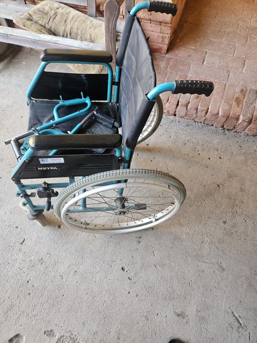 Căruț pentru persoane cu dizabilități