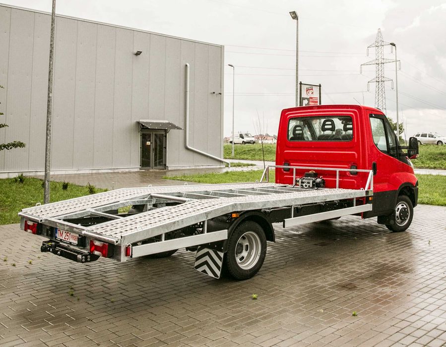 Transport auto pe platforma, tractare