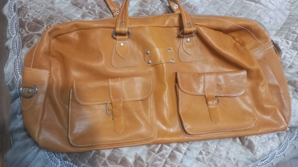 Продам кожаный новый саквояж