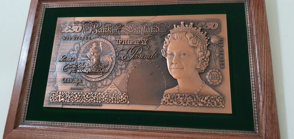 100$ и 50 фунт стерлинг купюра мисдан ясалган