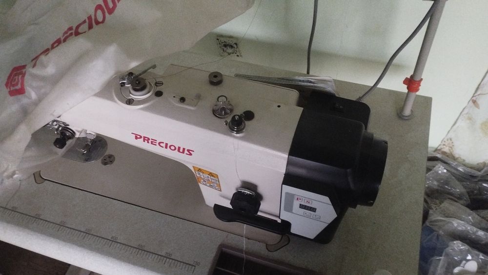 Yangi tikuv mashinka