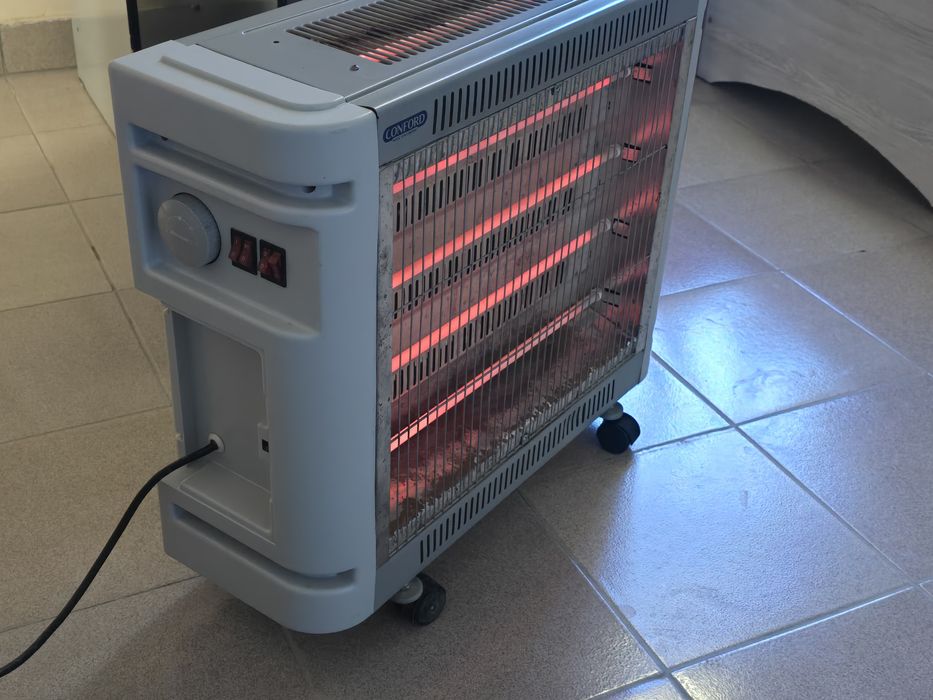 Печка обогреватель сотилади. Холати яхши