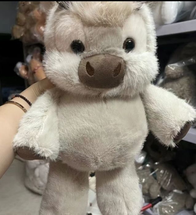 Теленок бегунок игрушка