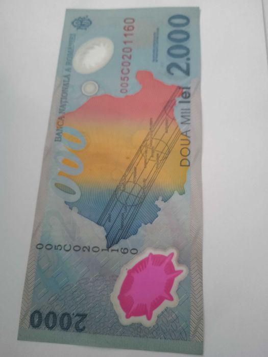 Bancnota de colecție, cu eclipsa, de 2000 lei, din 1999
