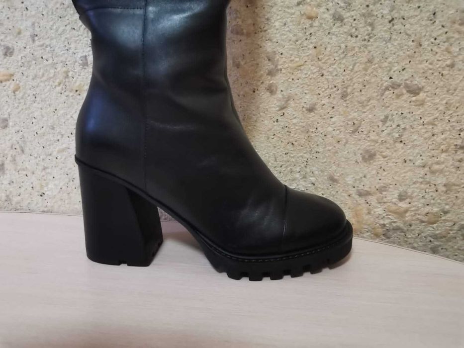 Продам женские сапоги