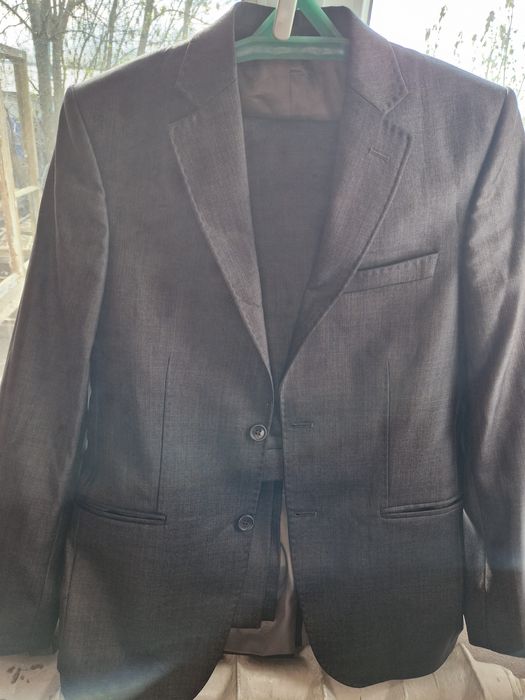 Ерлерге арналған костюм.