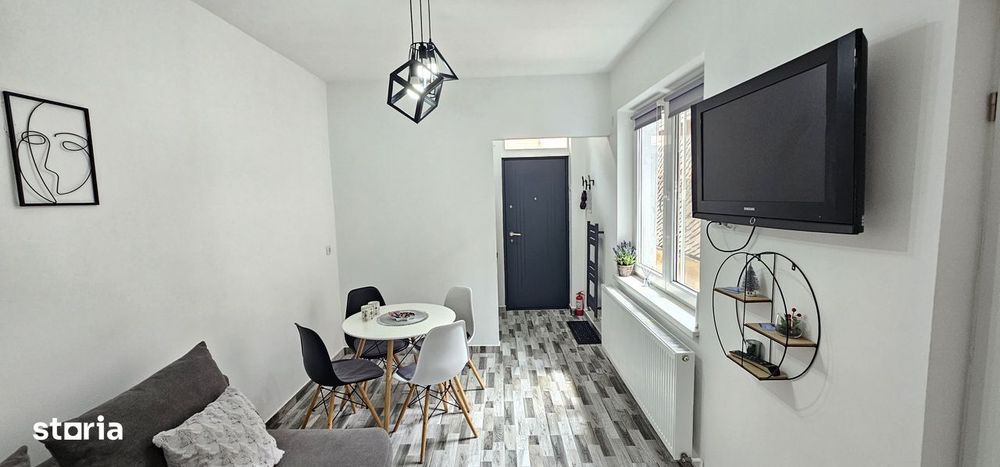 Apartament de vanzare cu terasă și beci, gata de utilizare