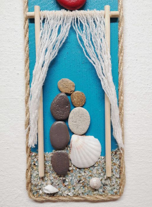 Ръчно изработен сватбен подарък от пясък, камъчета и раковини