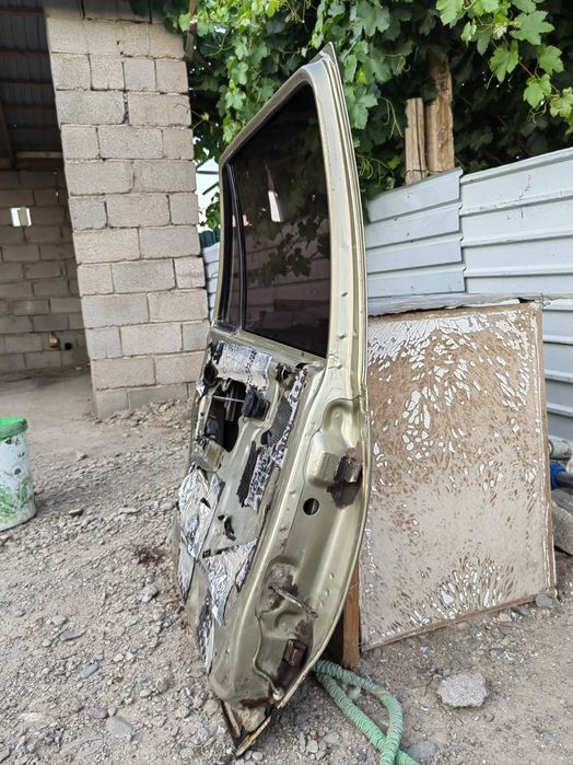 Двери нексия 2009