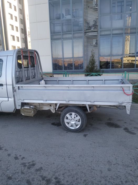 Грузовик, Жүк тасу, келісім бойынша.