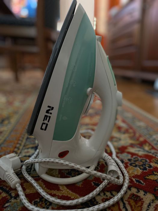 Ютия за гладене с пара Нео