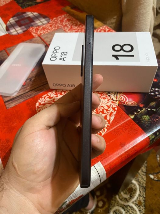 Vând oppo A 18  de 128GB