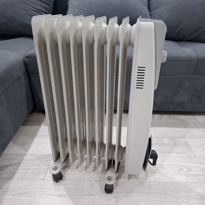 Масляный радиатор (обогреватель)