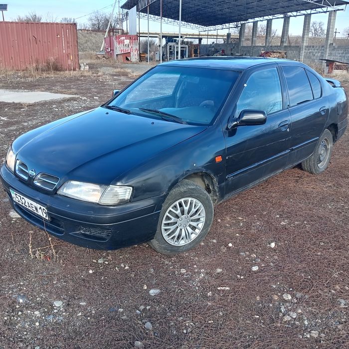 Ниссан примера р11