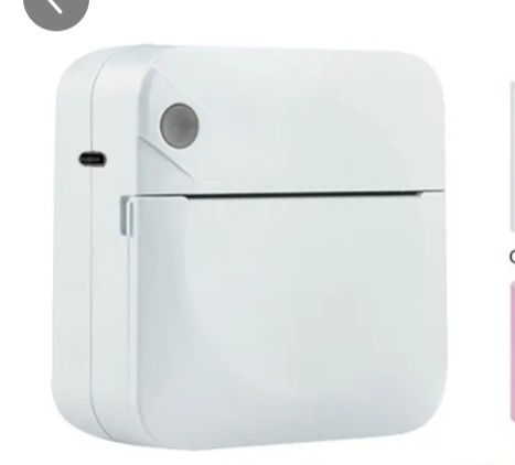 Мини принтер за печатане без мастило. Много удобен и лесен за употреба