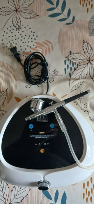 Aparat facial de cosmetica