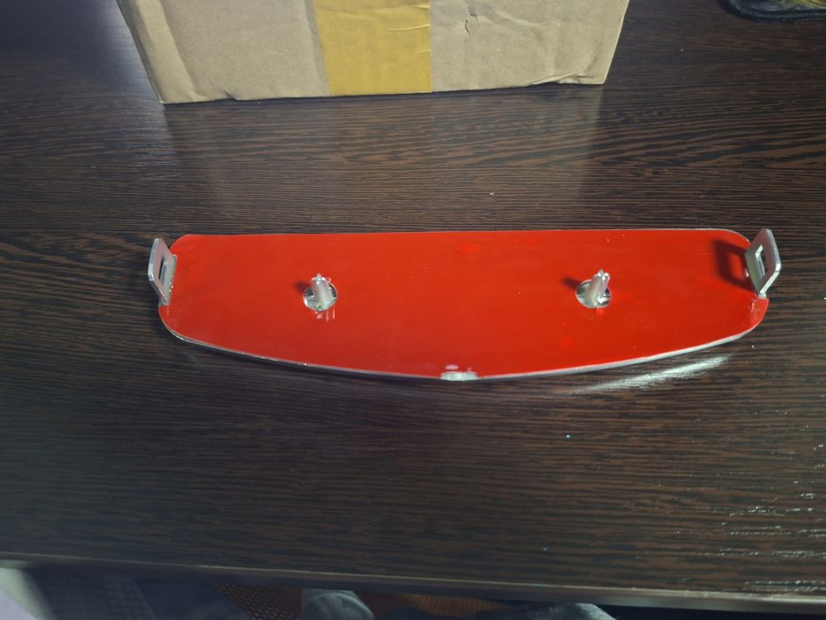 Geely emgrand  Значек