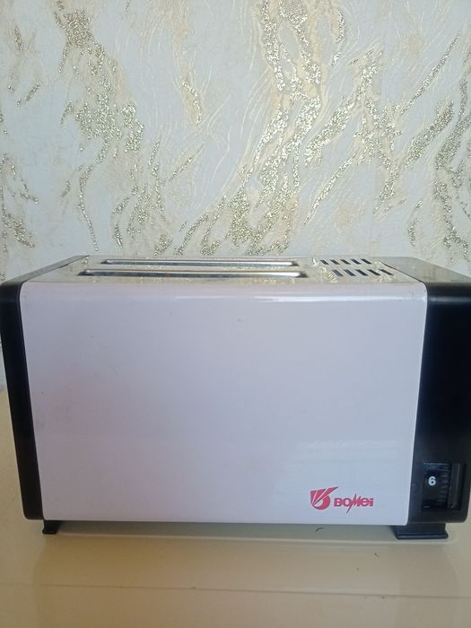 Продам тостер белый