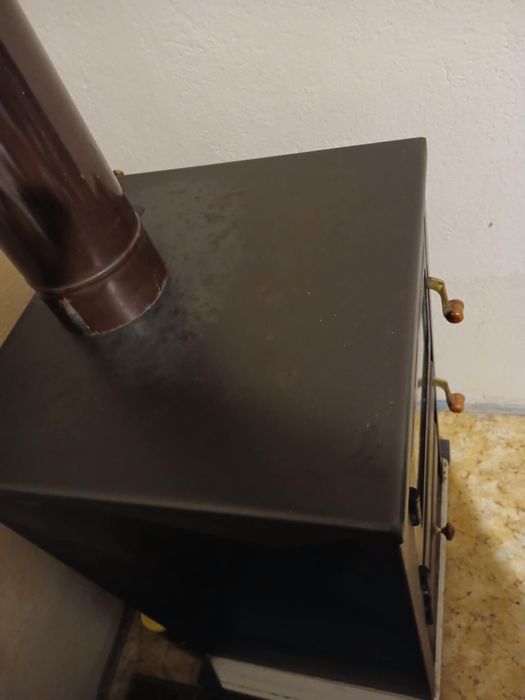 Запазена  камина на твърдо гориво