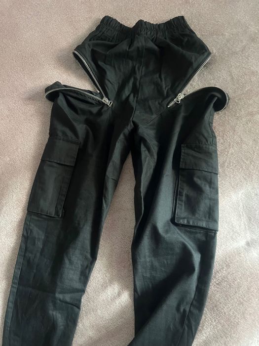 Pantaloni tip cargo cu fermoare